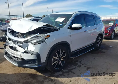 2021 Honda Pilot 2Wd Touring 8 Passenger z USA, uszkodzony, nr VIN 5FNYF5H97MB023526